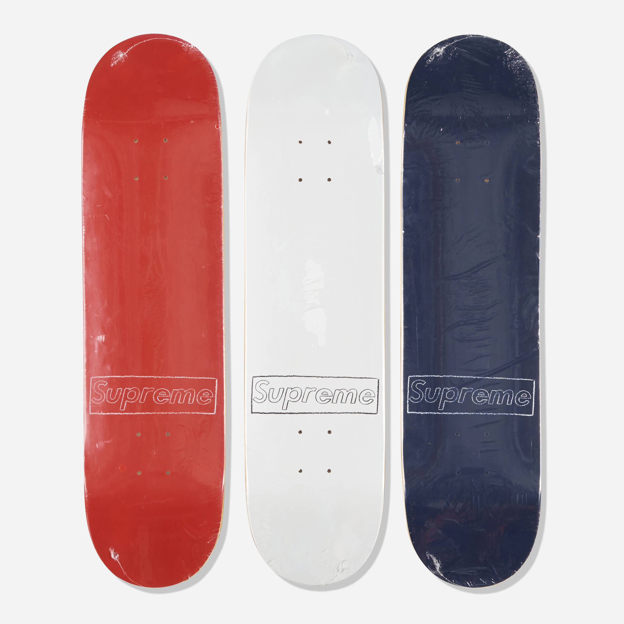 156: KAWS X SUPREME, Box Logo skateboard decks (Red, White and Blue) (three  works) < Unwrapped: Contemporary + Emerging Art, 9 September 2022 <  Auctions